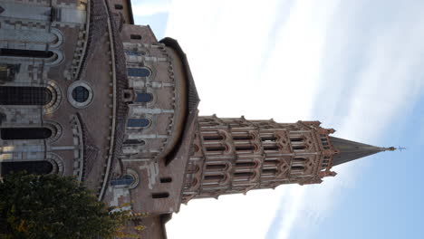 vertical view of basilica of saint-sernin bell tower in toulouse, france