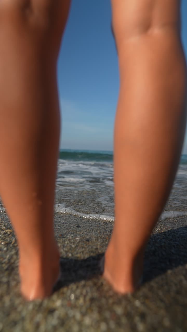 Gambe in spiaggia