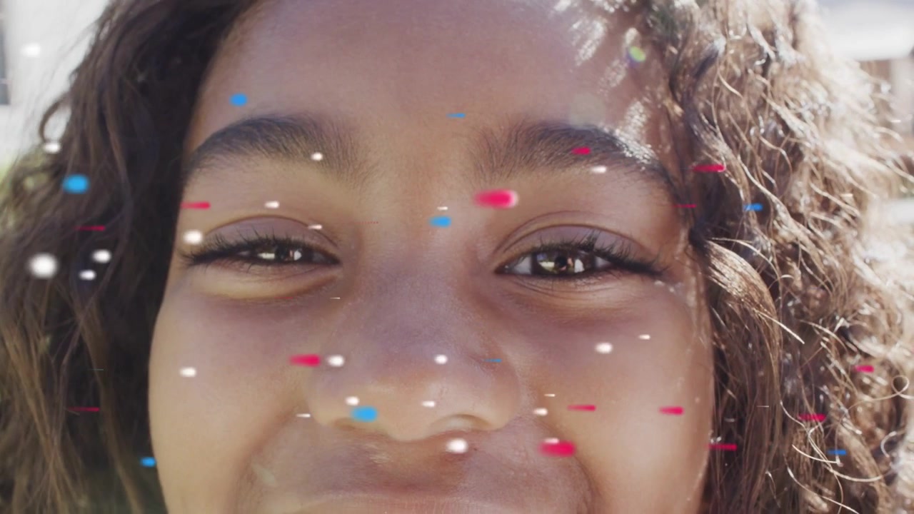 Girl leaning into camera while filter activating, confetti drifting across face, boosting marketing