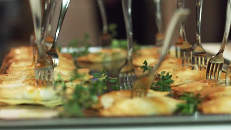 delicious food at the restaurant plate with bunch of forks