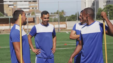 Soccer-players-discussing-on-field