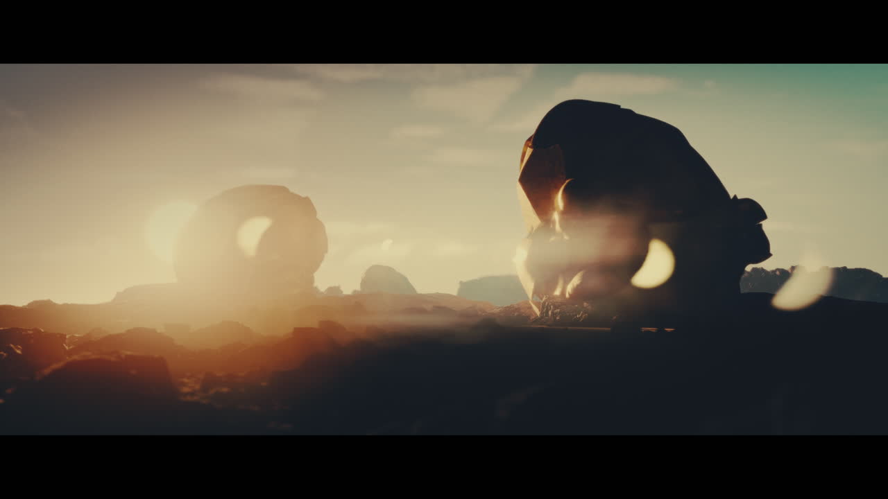 Huge golden statues in the desert during sunset