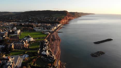 aerial shot of sidmouth and jurassic coast in devon england on a beautiful morning at sunrise