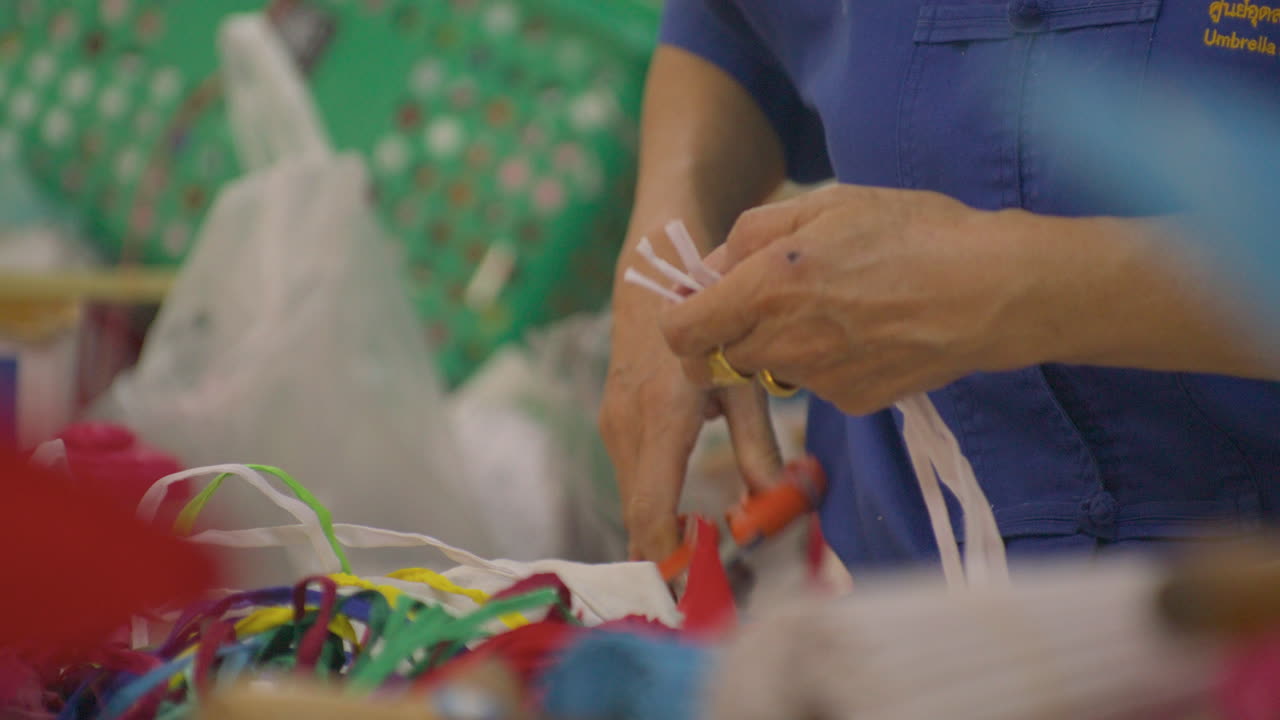 Cropped View Of Person In Bo Sang Umbrella Village Near Chiang Mai, Thailand. Close-up Shot