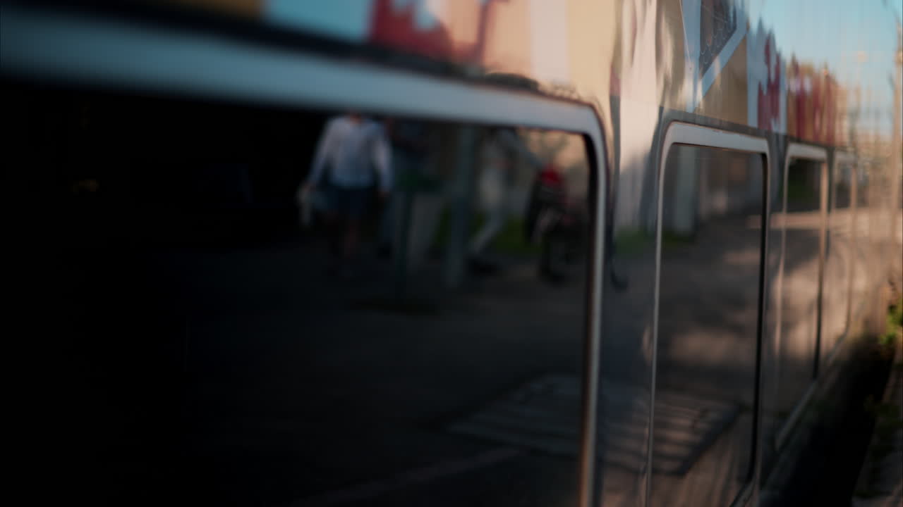 Close up of a two blue trains crossing on the rails near a station in France