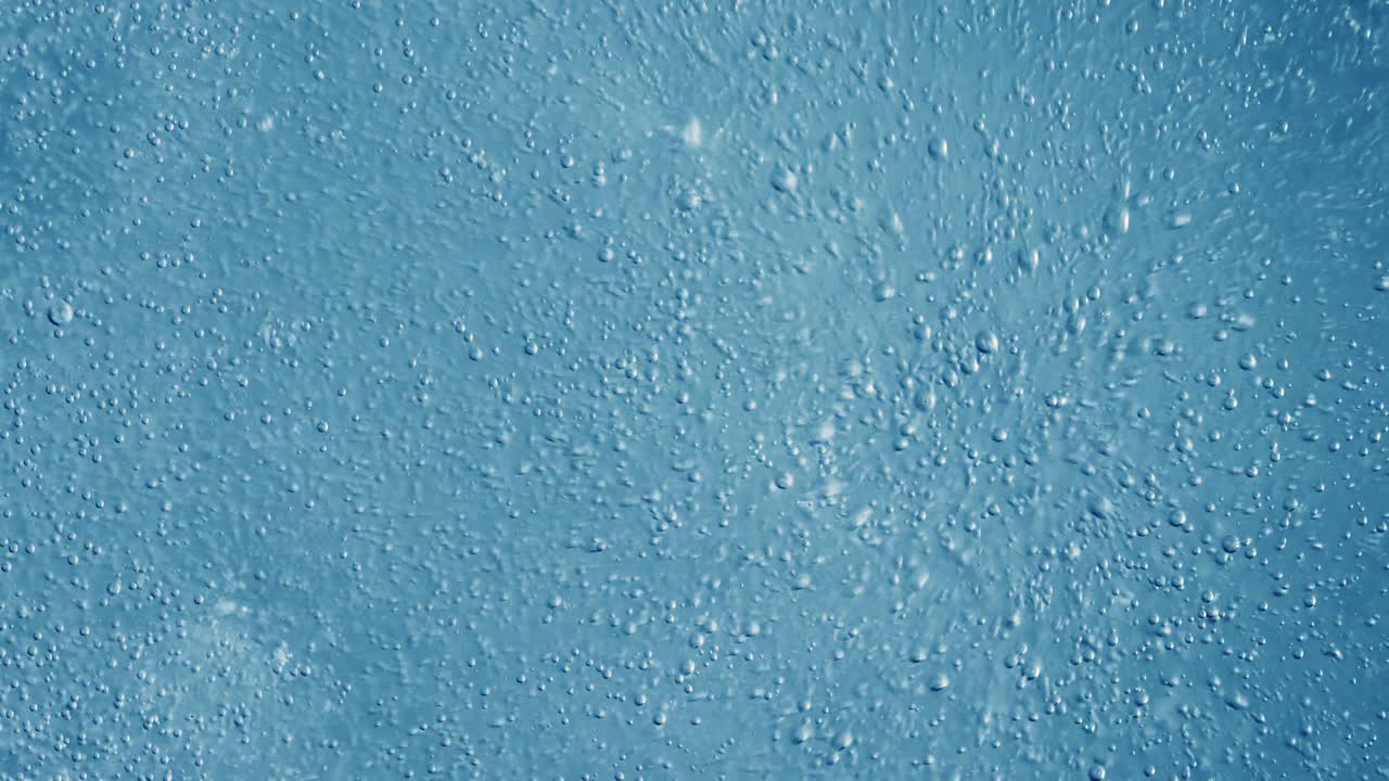 burbujas de oxígeno en el agua sobre un fondo abstracto azul