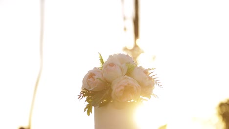 top of wedding cake outside flowers