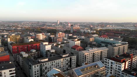 aerial flyover residential buildings at hisingen cityscape horizon, gothenburg, sweden