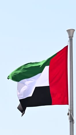 the uae flag proudly waves in abu dhabi, as preparations for national day