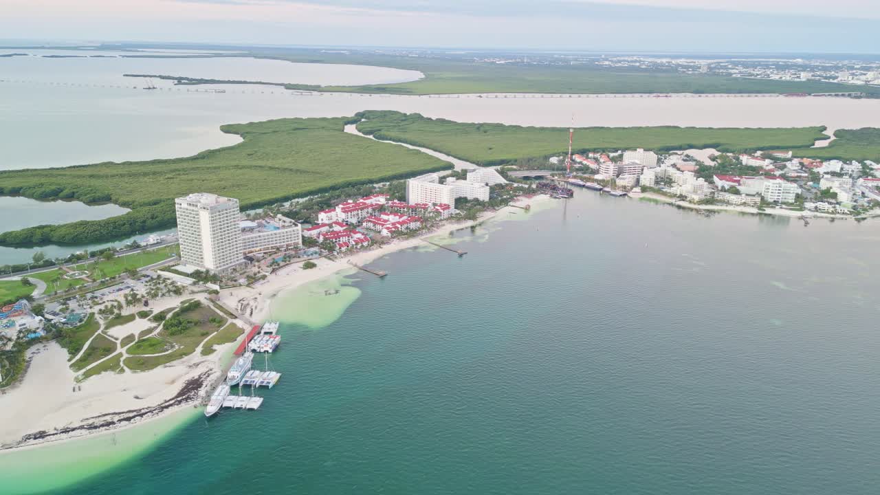 Playa langosta in cancun, featuring white sand beaches and resorts, aerial view