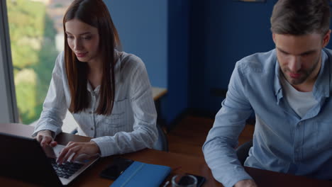 multiracial business team working remote at workplace in business center.