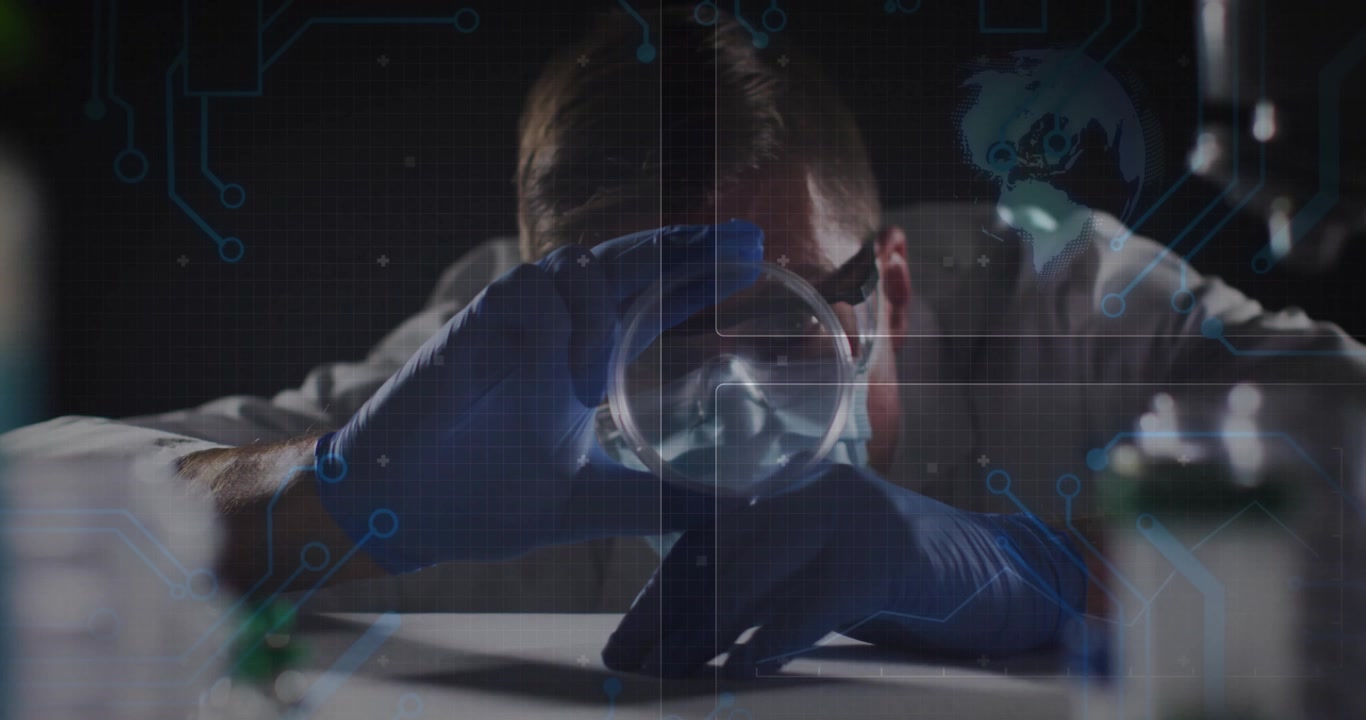 mid adult male scientist examining petri dish under dim lab light, with digital circuit overlay