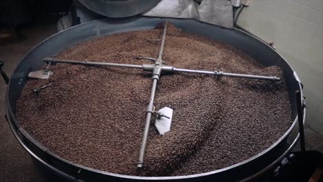 coffee roasting process - coffee beans in roasting machine. overview.
