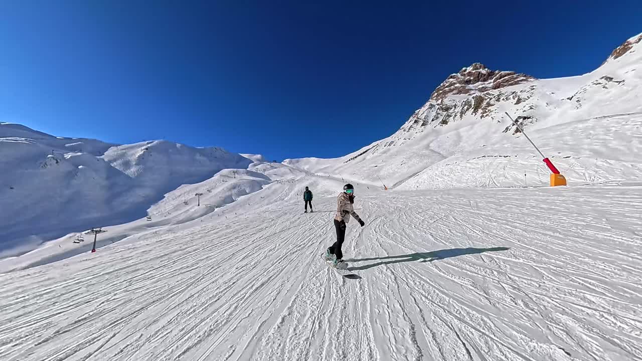 Skiing and Snowboarding in the Mountains