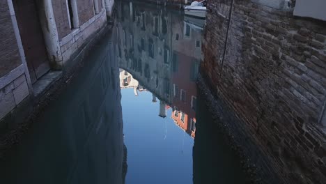 venice, italy – multicolored buildings reflected in canal water-1