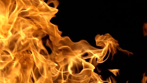 Flames-of-fire-on-black-background-in-slow-motion