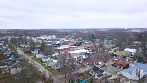 aerial view flying across idyllic sheridan town community property autumn midtown neighbourhood, indiana