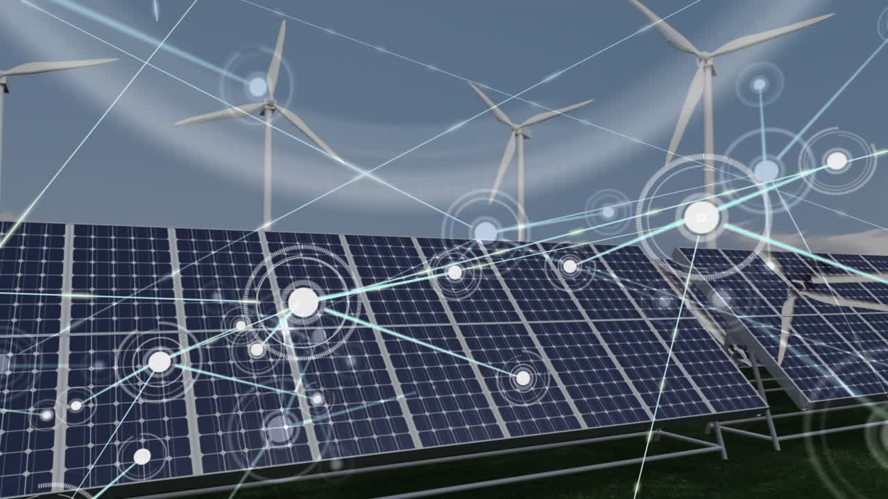 태양광 패널과 여러 풍차에 대한 연결 네트워크가 푸른 하늘에 대해 회전하고 있습니다.
