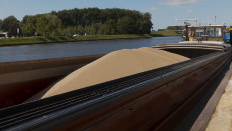 A-docked-cargo-boat-filled-with-grains