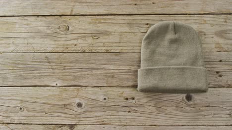 video of close up of hat on wooden background