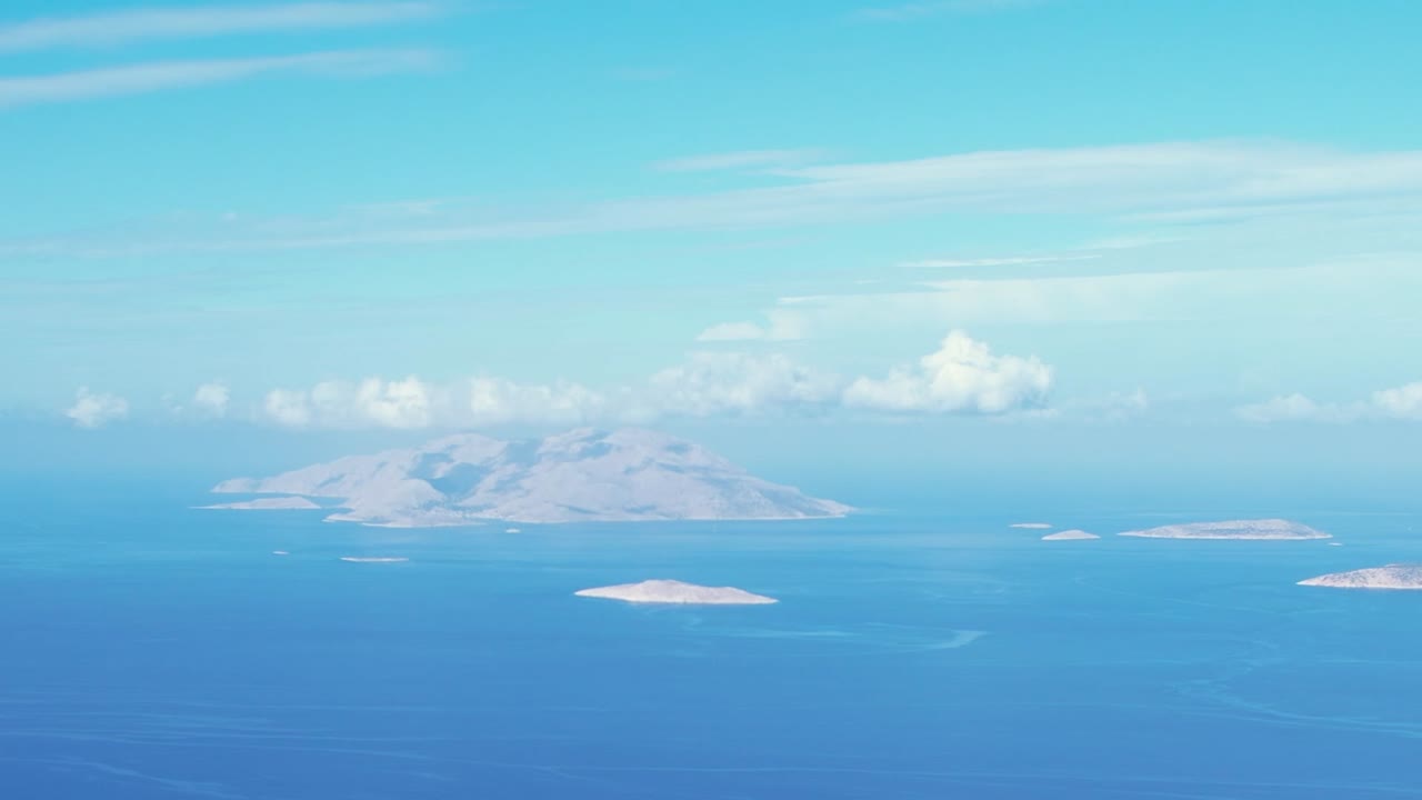 Beautiful aerial view of Greek islands in clear blue waters