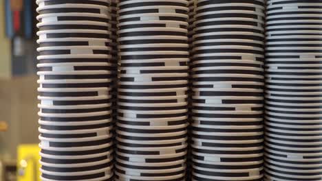 stack of black and white coffee cups