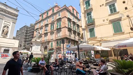 people enjoying a sunny day at a café