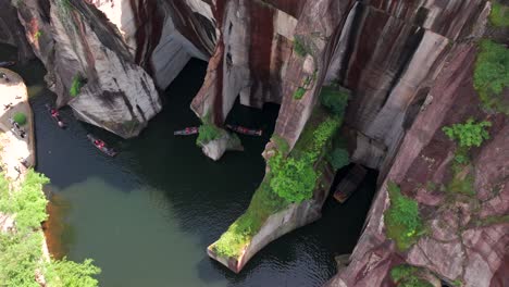 aerial photo of donghu lake in shaoxing, zhejiang, china, formed after thousands of years of artificial mining, showcasing beautiful and spectacular artificial landscapes