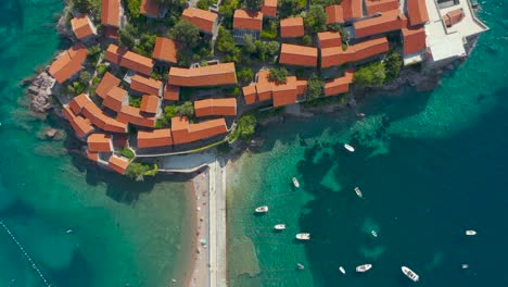 top view of island of sveti stefan with houses in sea, montenegro