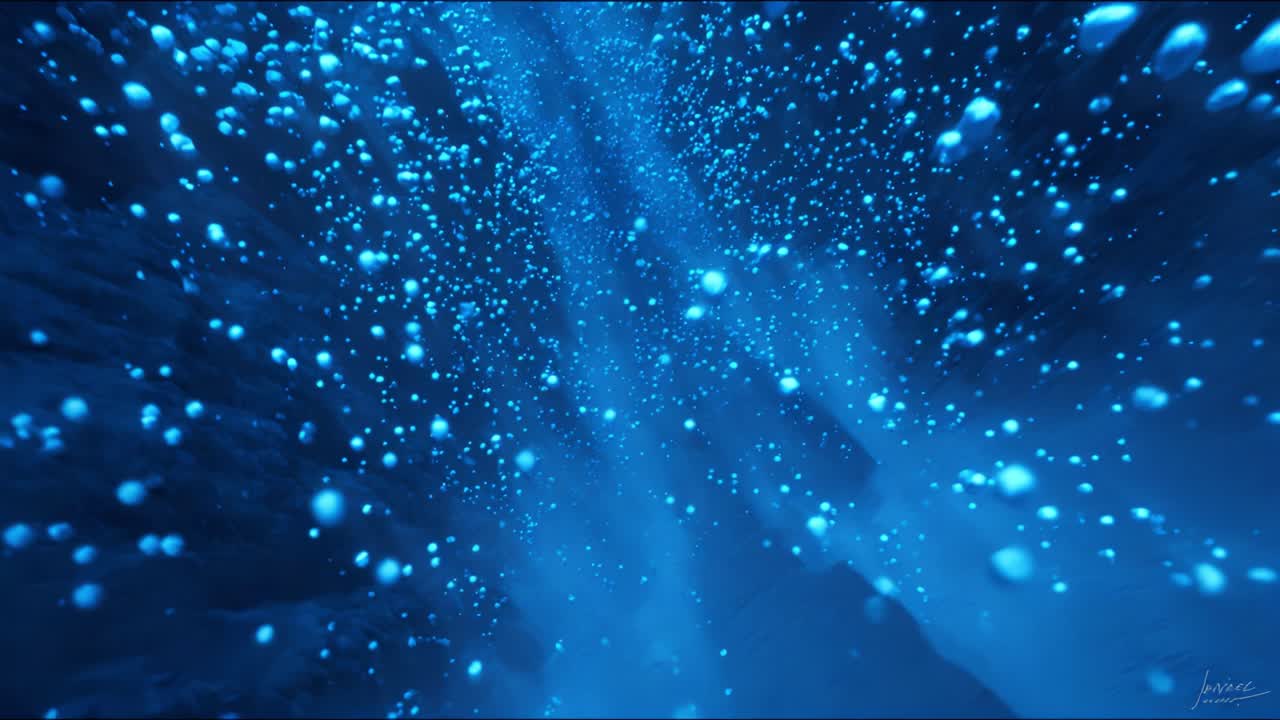 A Stunning Exploration of Underwater Light: Captivating Blue Particles Illuminate a Mysterious Ocean Depth, Creating a Dreamlike Atmosphere of Enchantment and Tranquility