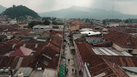 Famous-Guadalupe-Street-In-San-Cristobal-de-las-Casas,-Chiapas,-Mexico---aerial-drone-shot