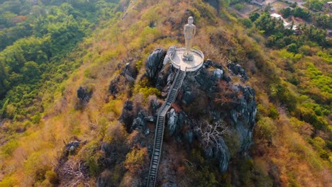 hiking on a path in thailand on a mountain with a view