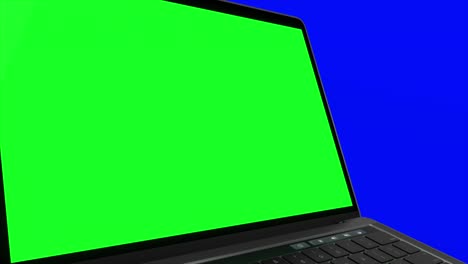 video 4k. portátil (computador portátil) encendiendo con pantalla verde sobre un fondo azul.