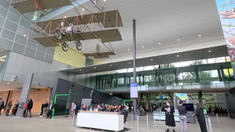 people exploring the museum's aviation exhibit