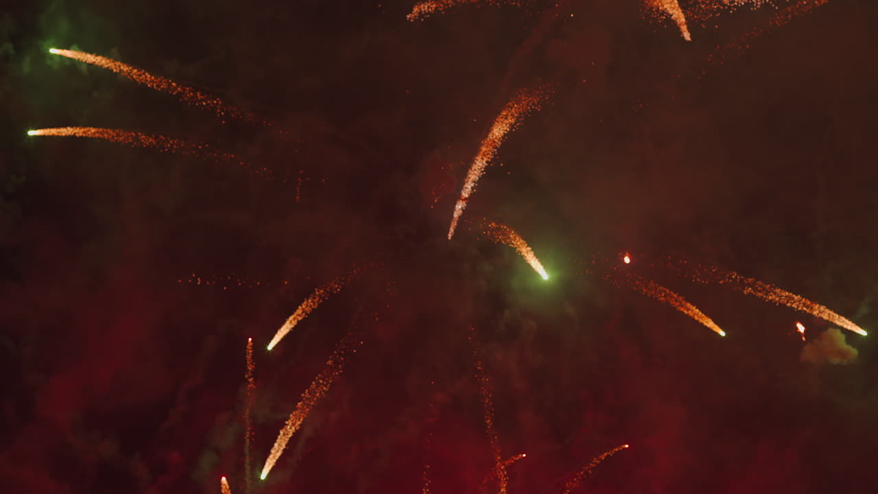 Colorful Fireworks Exploding and Bursting in the Night Sky