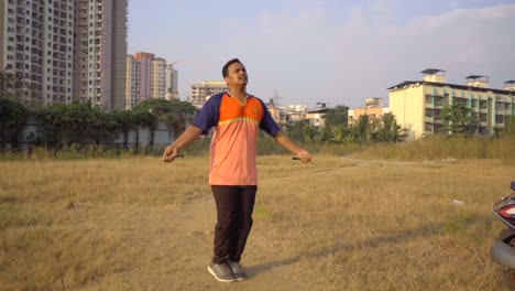 fat boy man jumping skipping rope for weight loss in morning