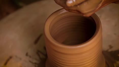 potter at work makes ceramic dishes. india, rajasthan.