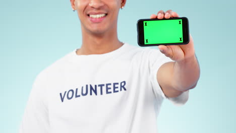 Phone,-green-screen-and-closeup-of-man-in-studio