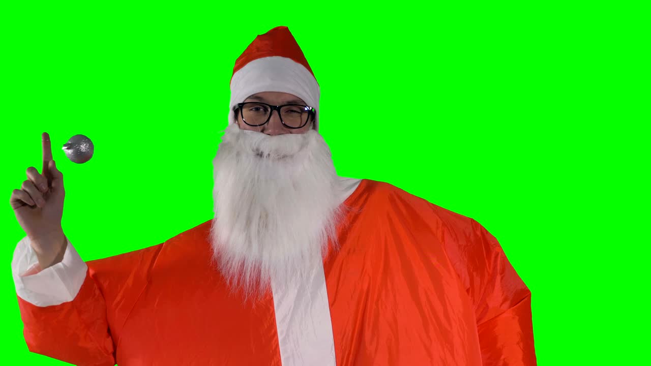 산타클로스는 한 손가락에 크리스마스 보블을 흔들고 손가락을 잃습니다.