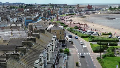 morecambe town hotels rooftops aerial view overlooking busy sunny seaside promenade street