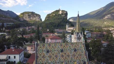 Aerial-of-a-small-Italian-town-called-Arco-in-Italy-nearby-Riva-del-garda,-Garda-lake-in-province-Trentino