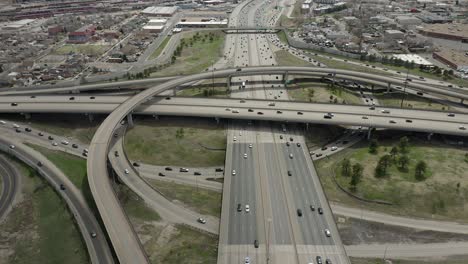 aerial panning view of highway traffic loop