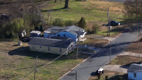 rundown drug houses in low income poverty stricken neighborhood in southern usa