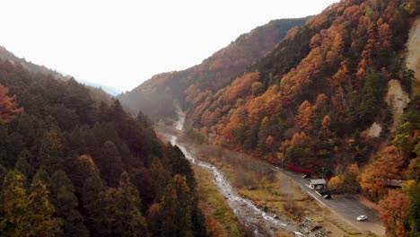 Aerial-Drone-view-through-mountains-of-Japan-in-Autumn-2