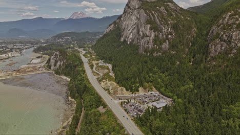 Squamish-BC-Canada-Aerial-v3-birds-eye-view,-flyover-sea-to-sky-highway-capturing-river-channel,-Stawamus-Chief-granite-monoliths,-town-and-forested-mountains---Shot-with-Mavic-3-Pro-Cine---July-2023