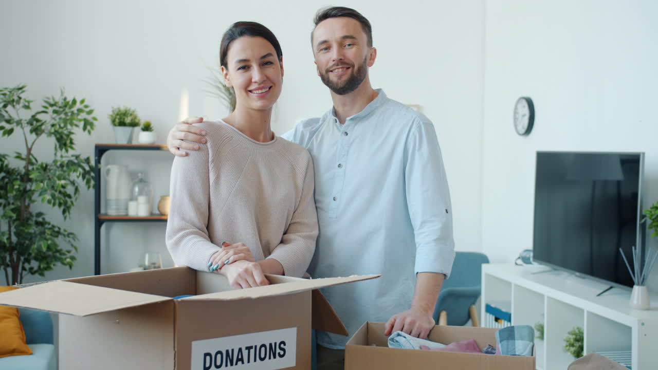 Couple Donating Items