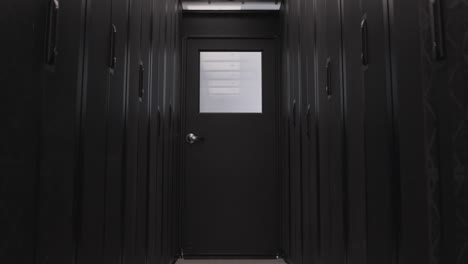 Corridor in server room of data center with cloud digital storage