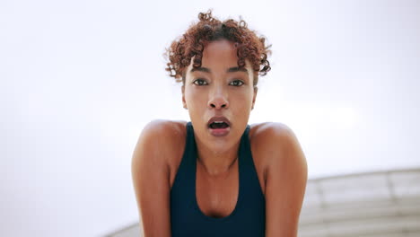 woman exercising outdoors in the summer heat