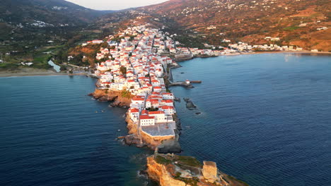 aerial view video of iconic andros island chora, cyclades, greece at dusk