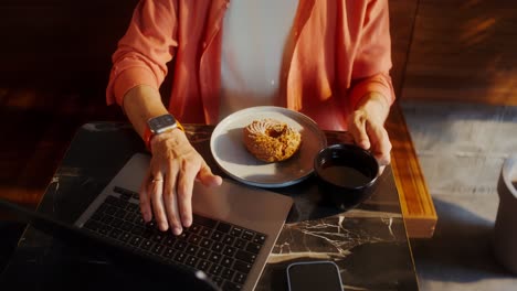 man working at a cafe